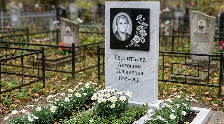 Памятник с гравировкой ромашек — выполненная работа «Терентьева» в Красноярске