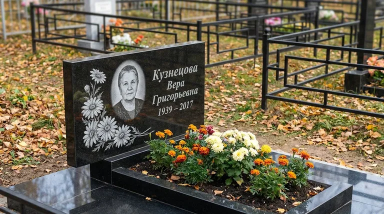 Памятник с гравировкой ромашек — выполненная работа «Кузнецова» в Красноярске