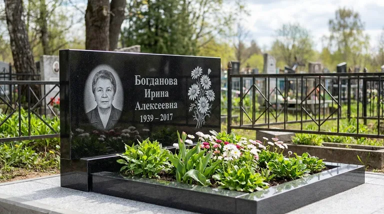 Памятник с гравировкой ромашек — выполненная работа «Богданова» в Красноярске