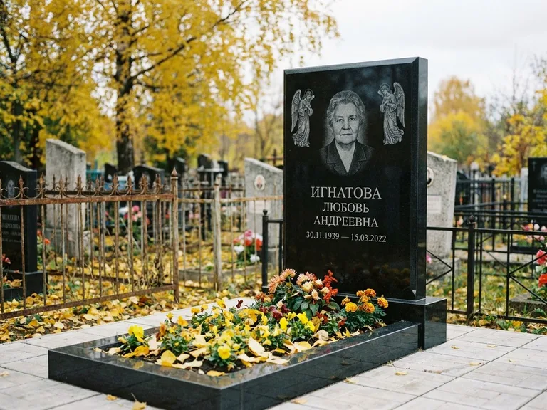 Памятник с гравировкой ангела — гравировка двух ангелов по сторонам портрета, работа «Игнатова» в Красноярске
