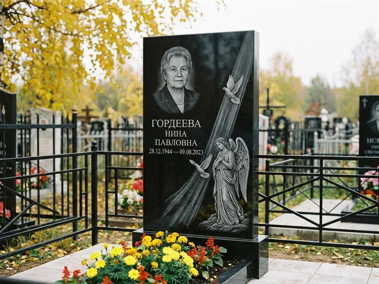 Памятник с гравировкой ангела — гравировка ангела с голубем по диагонали стелы, работа «Гордеева» в Красноярске